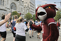 Hooter cheers on runners during the Broad Street Run
