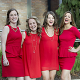 Temple Alumni in red dresses