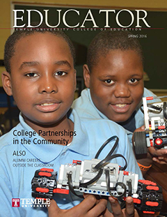 Educator Magazine cover featuring two boys holding robotic cars