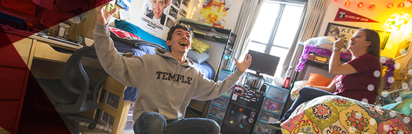Two Temple students in a dorm room.