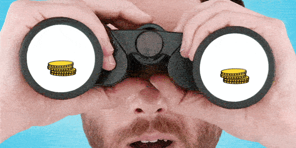 A man viewing a stack of coins through binoculars.