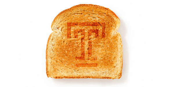 A picture of a piece of toast with the Temple T on it.