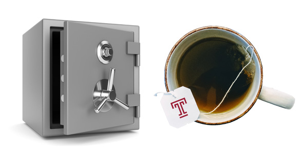 A safe with its door partially open and a cup of tea featuring a Temple “T” on the tea bag’s string. 