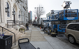 Lighting equipment on the sidewalk outside the Temple Performing Arts Center.