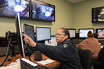 A woman working in the new dispatch center. 