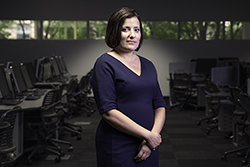 Sara Goldrick-Rab standing in a computer lab.