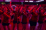 Members of the marching band cheering at Convocation.