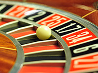 A red, white and black roulette wheel.