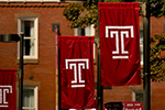 Four Temple “T” flags on Main Campus.